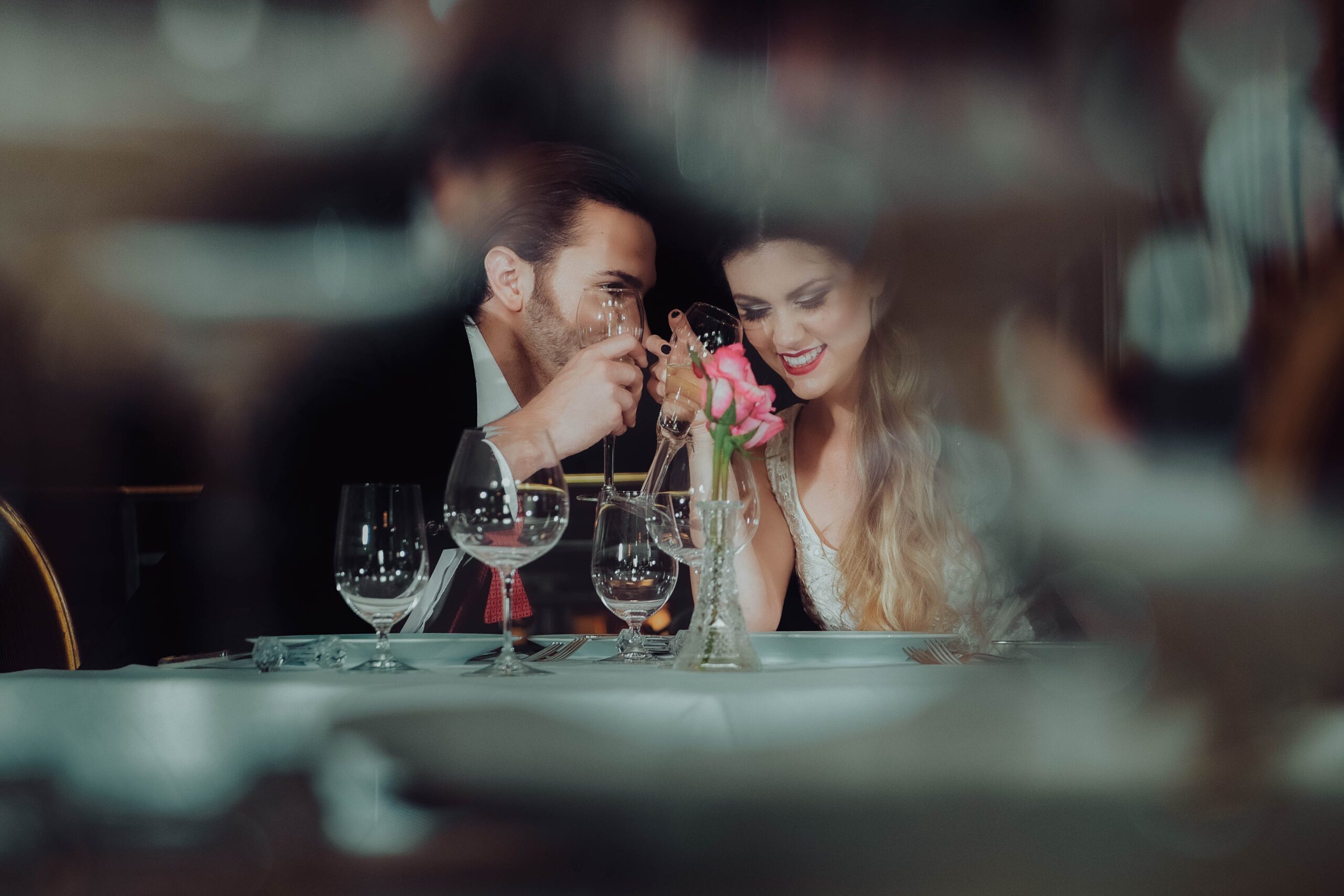Couple posing in vintage Gatsby-inspired outfits at the Adolphus Hotel in downtown Dallas