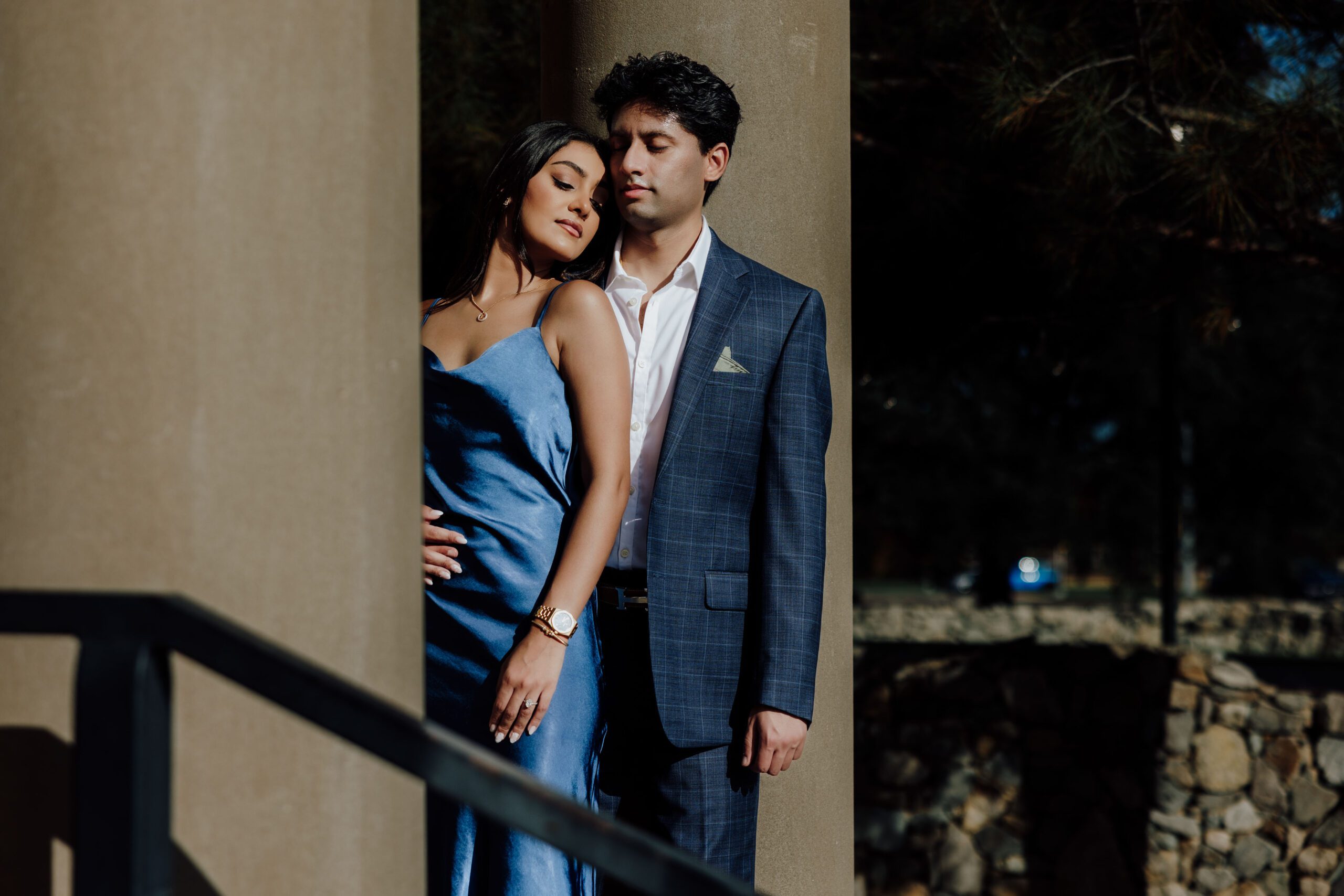 couple romantic poses during their engagement session at the adriatica in mckinney texas