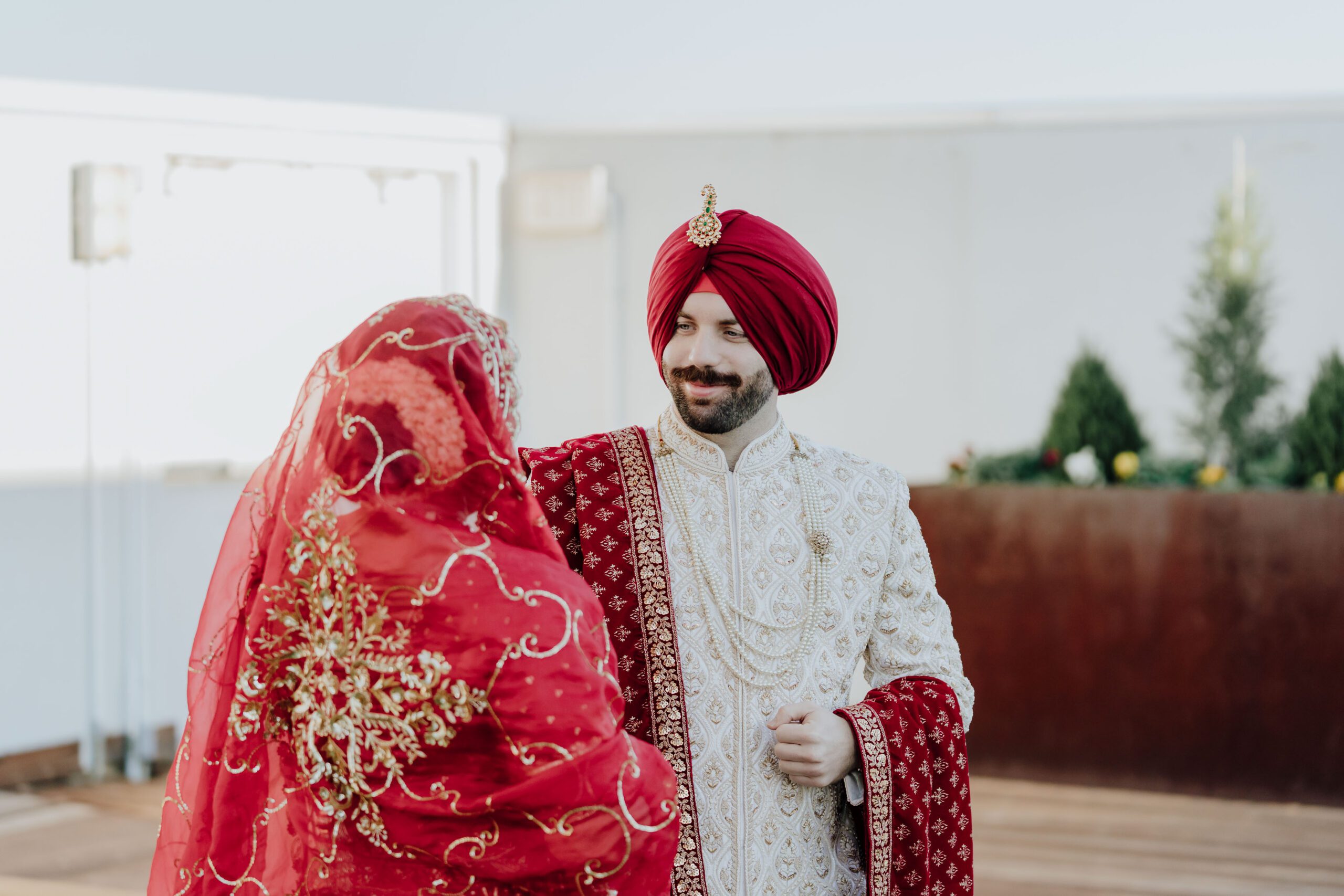 first look of Surbhi and Travis at Renaissance Dallas before they head to their sikh ceremony