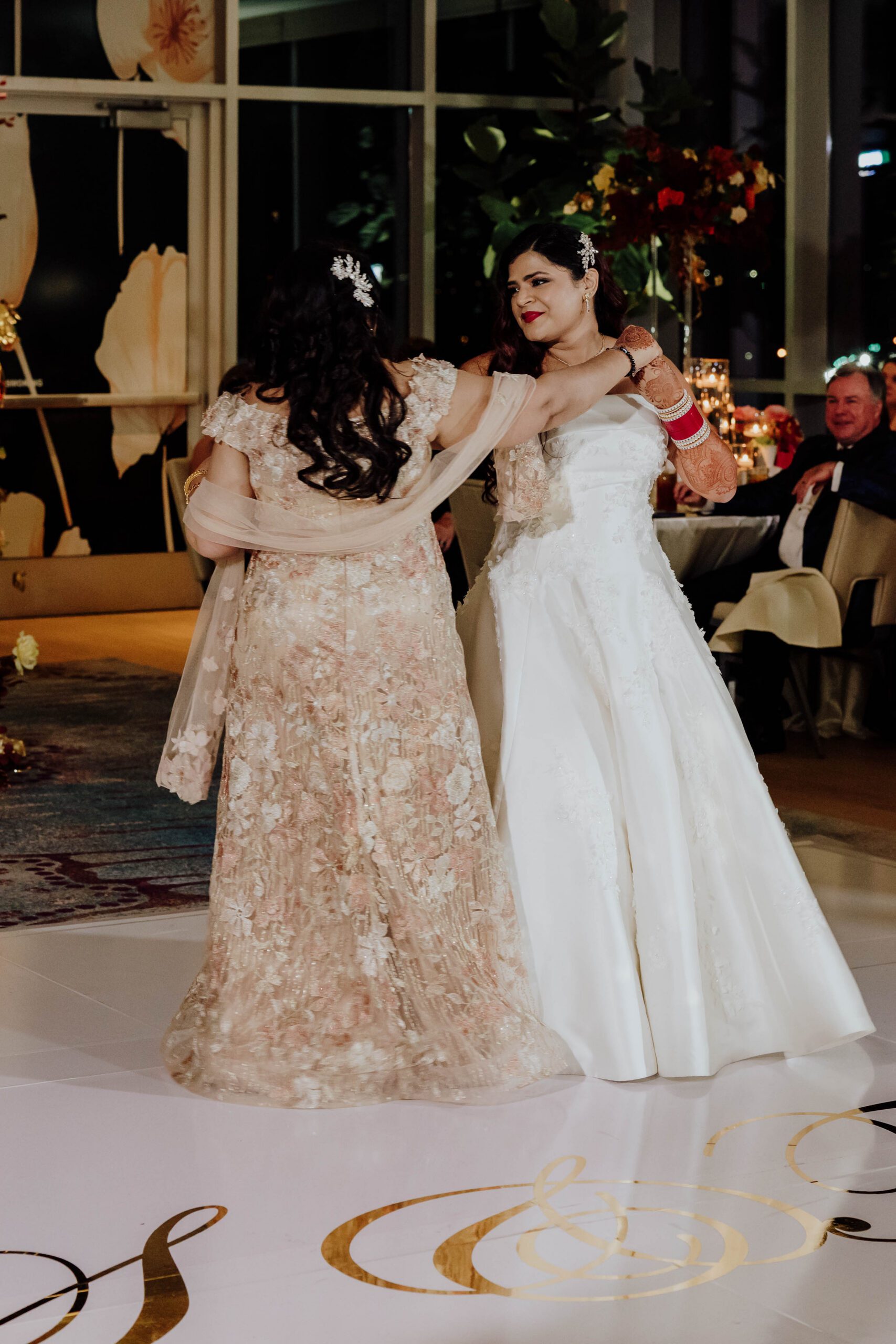 Multicultural wedding reception at Renaissance Dallas Hotel Dallas Texas photographed by William Bichara
