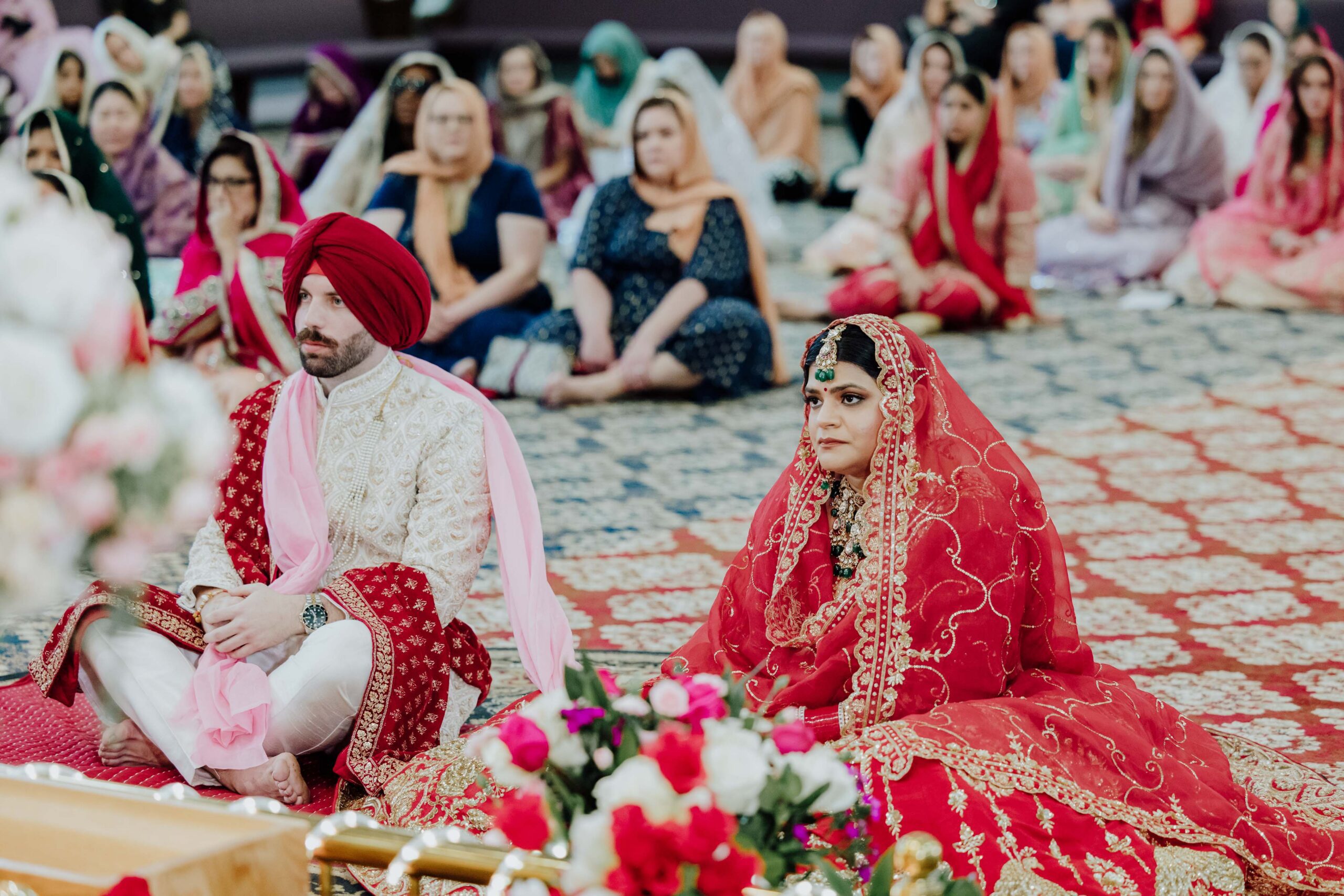 Bride Surbhi in traditional Sikh bridal attire at Gurdwara Sikh Sangat Euless Texas
