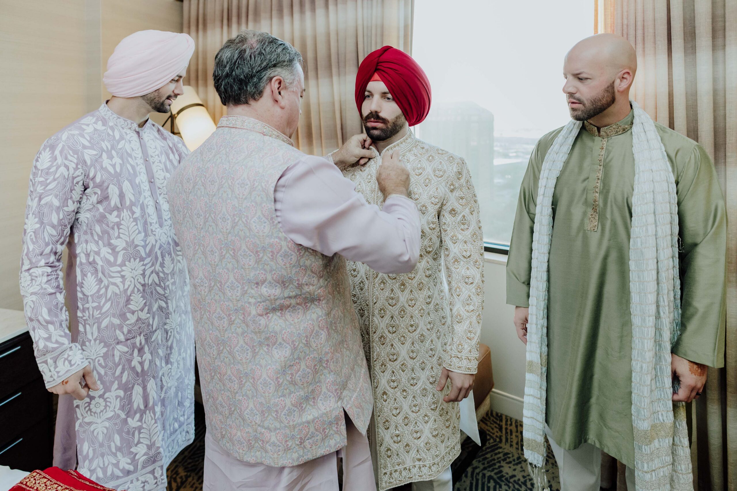 groom getting ready before the sikh ceremony