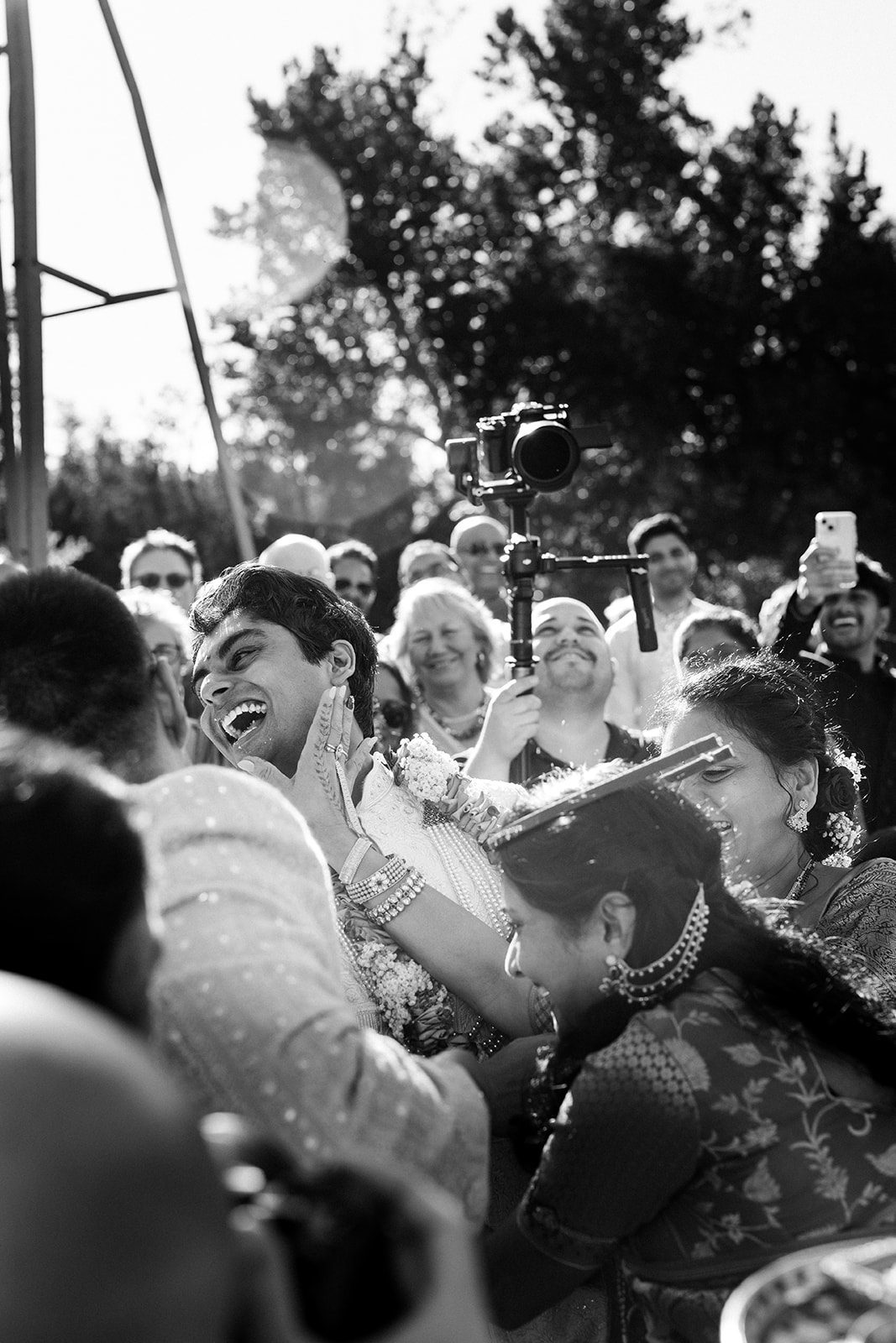 Mother of bride welcoming groom after Barat photographed by Dallas Wedding Photographer William Bichara